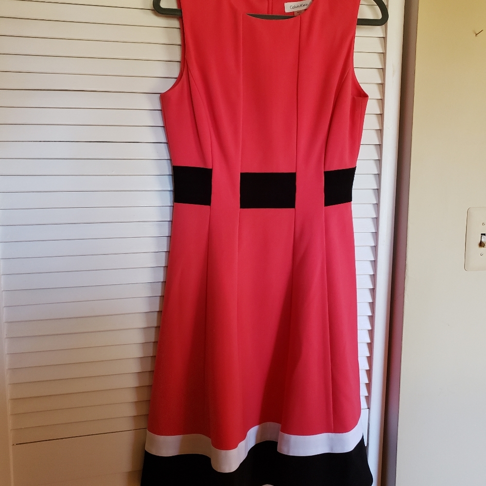 Red belted dress with bold stripes